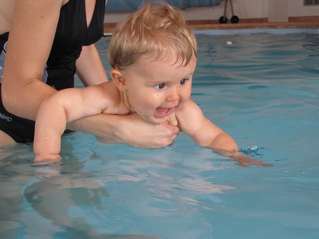 newborn baby swimming